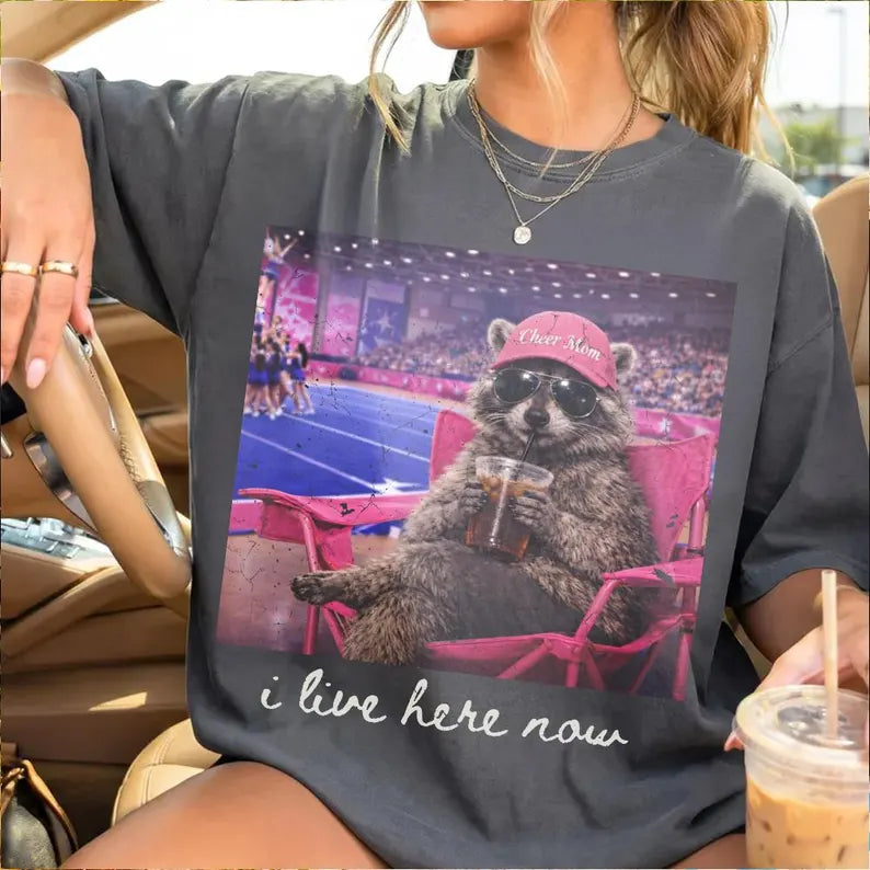 I Live Here Now Cheerleading Raccoon Pink PREORDER